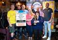 'Exceptional' amount raised at charity darts event in Inverness