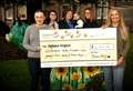 Family's £6700 donation to Highland Hospice after fundraising darts tournament