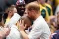 Harry kisses wheelchair rugby player on head at Invictus Games