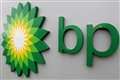 Protesters disrupt BP meeting as boss recommits extra money for fossil fuels
