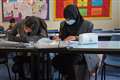 What are the rules on face coverings in UK schools?