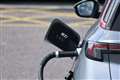 Cop28: Mark Harper announces trials to boost EV charging at motorway services