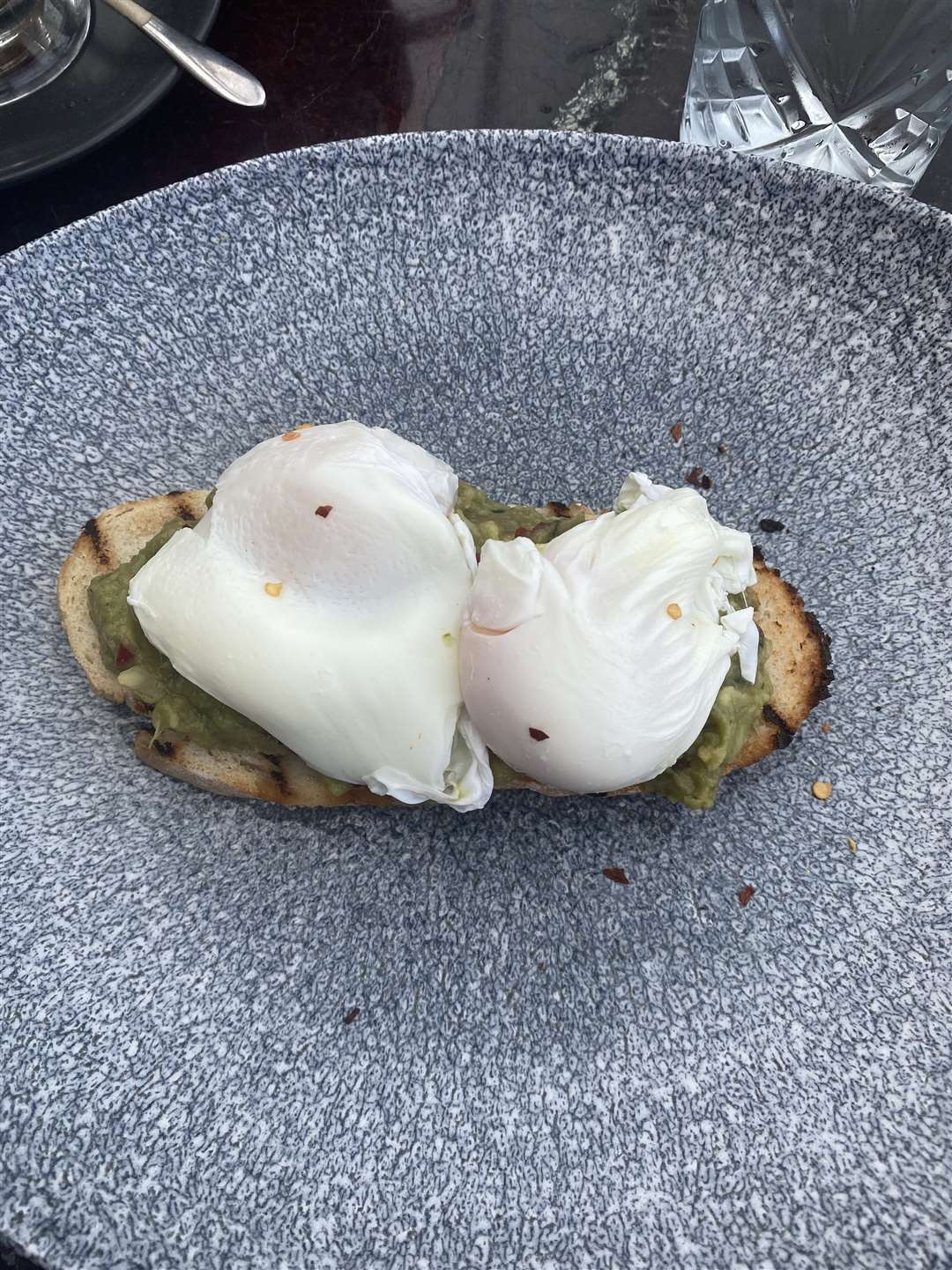 Breakfast of delicious avocado and egg.