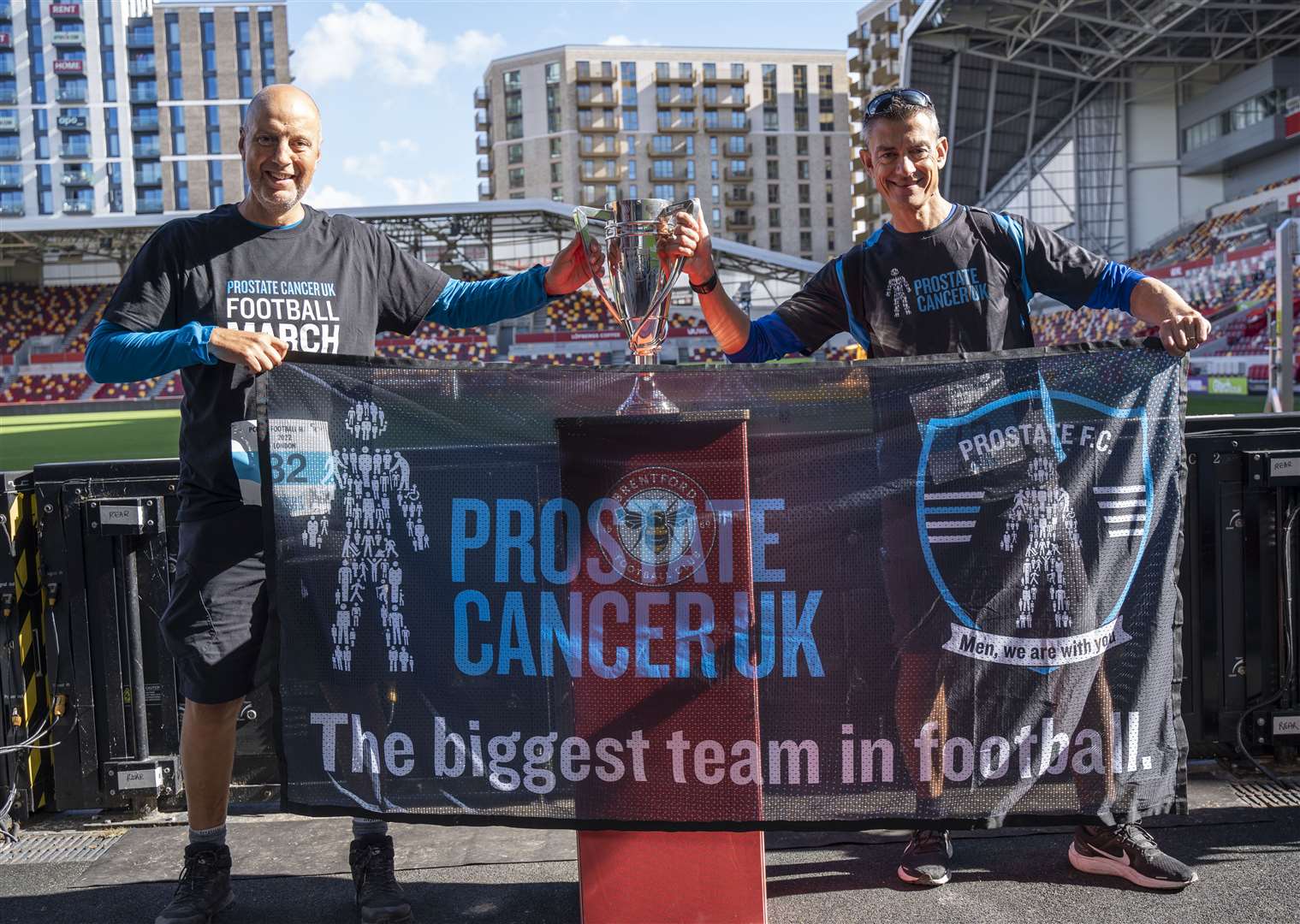 Kevin Webber (left) and Ian Tetsill (right) at Jeff Stelling’s football march in London (Rosie Lonsdale/Prostate Cancer UK)