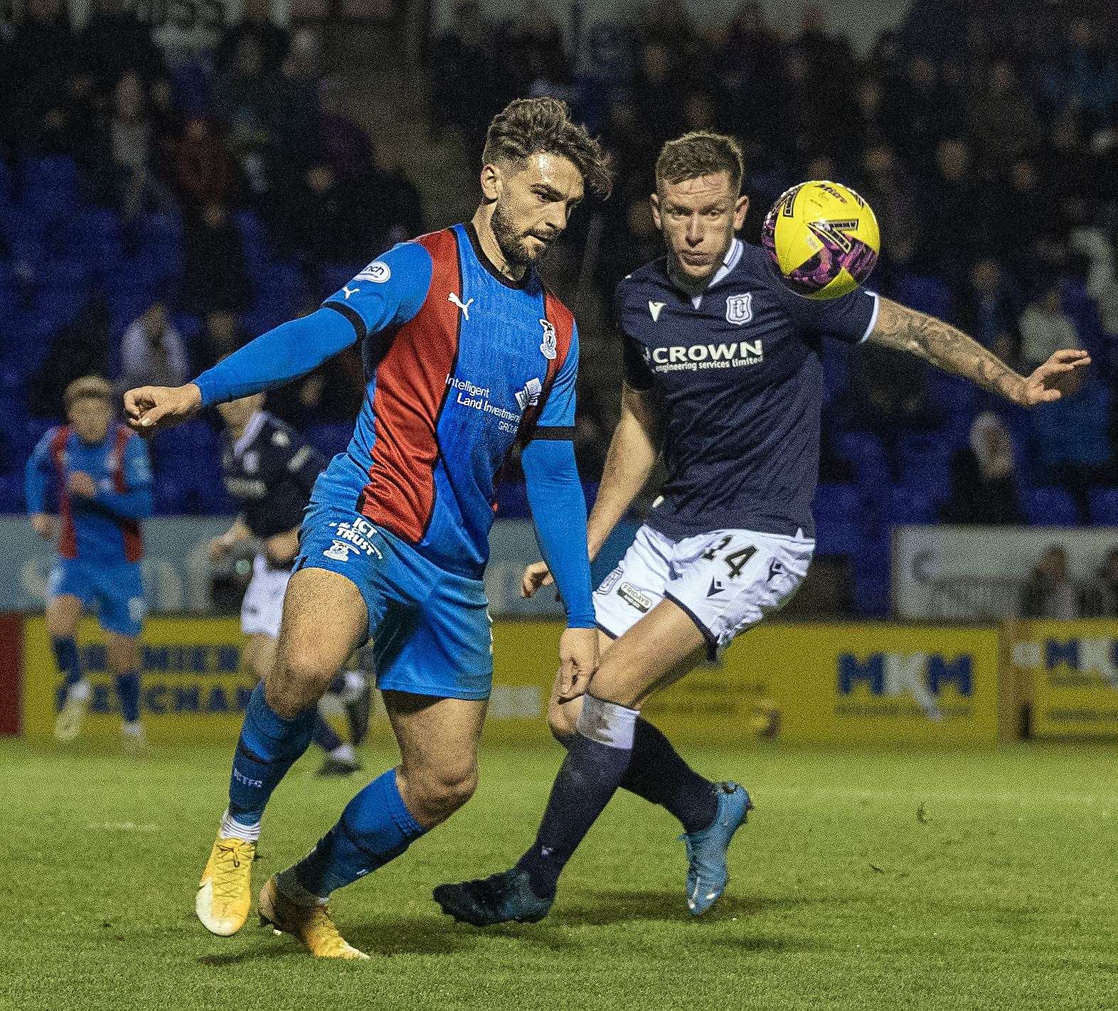 George Oakley (left) in action for Caley Thistle.