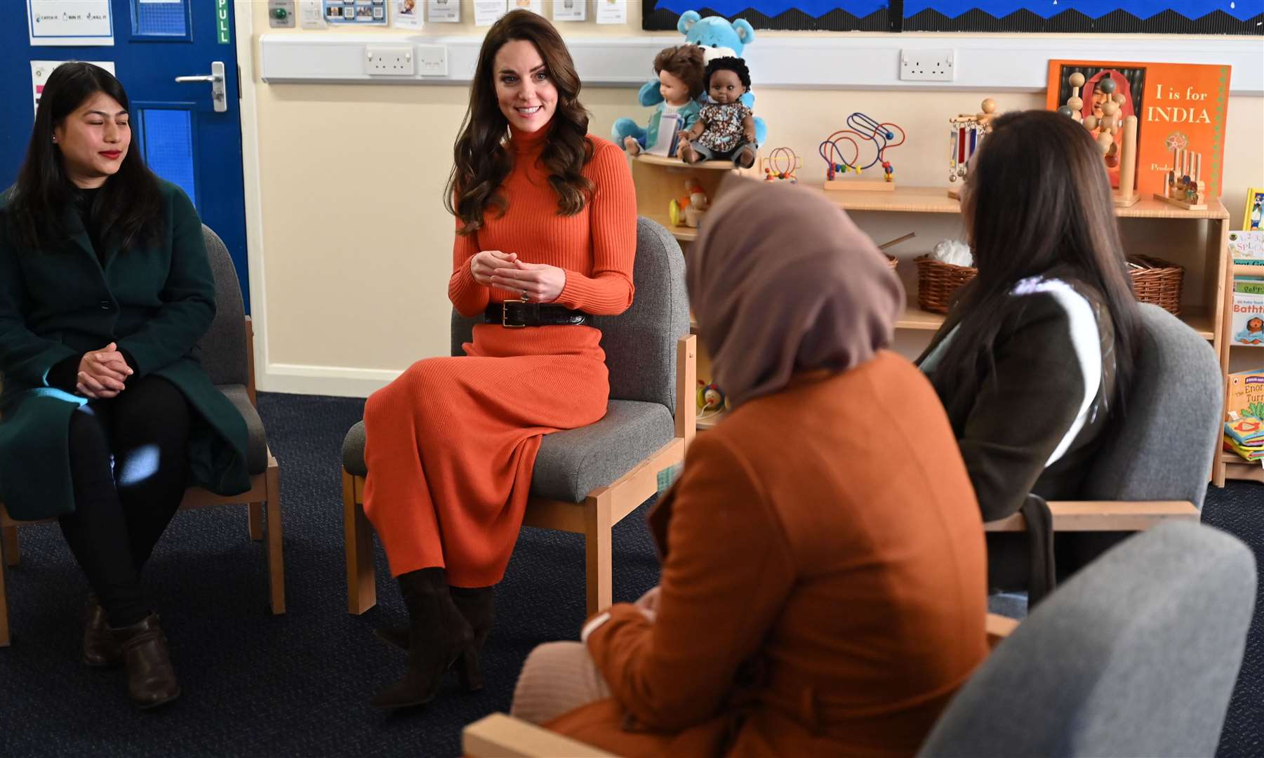 The Princess of Wales talks to parents during her visit to Foxcubs nursery in Luton (Justin Tallis/PA)
