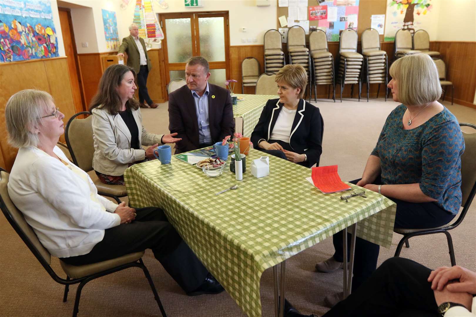 Chatting with volunteers at a foodbank in Merkinch. Pictured with the First Minister are Marilyn MacIver, Anne Sutherland, and Lorna Dempster (foodbank coordinator) and Drew Hendry MP. Picture: John Baikie 037660.