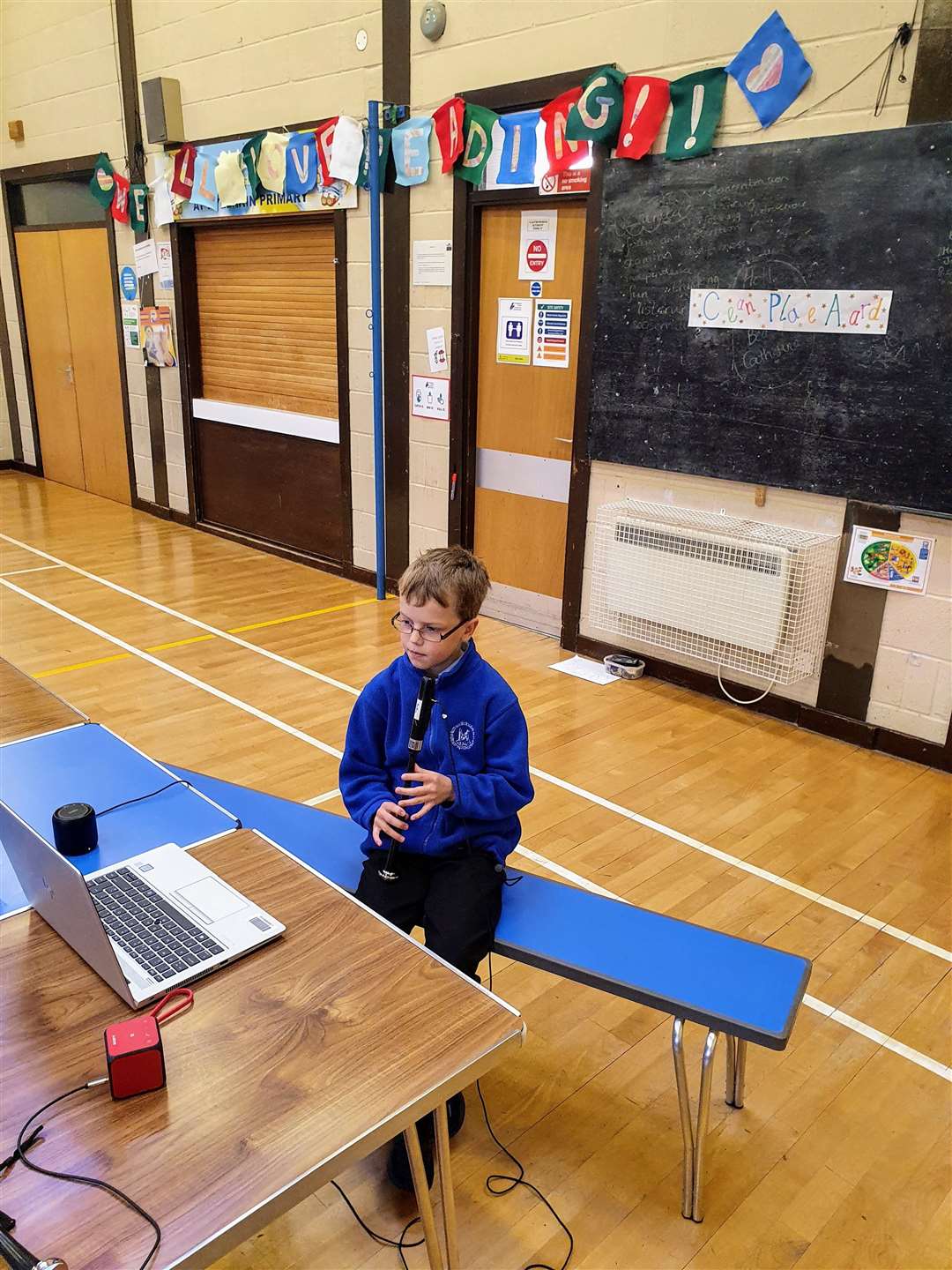 A pupils uses one of the new electronic chanters.