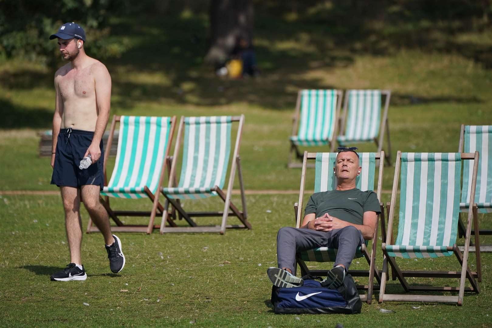 People enjoying the warm weather in Hyde Park in central London on Sunday (Jonathan Brady/PA)