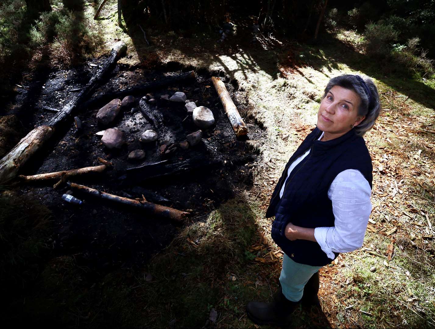 Lizzie Rose stood next to the ashes of the fire that almost got out of control. Picture: James Mackenzie.