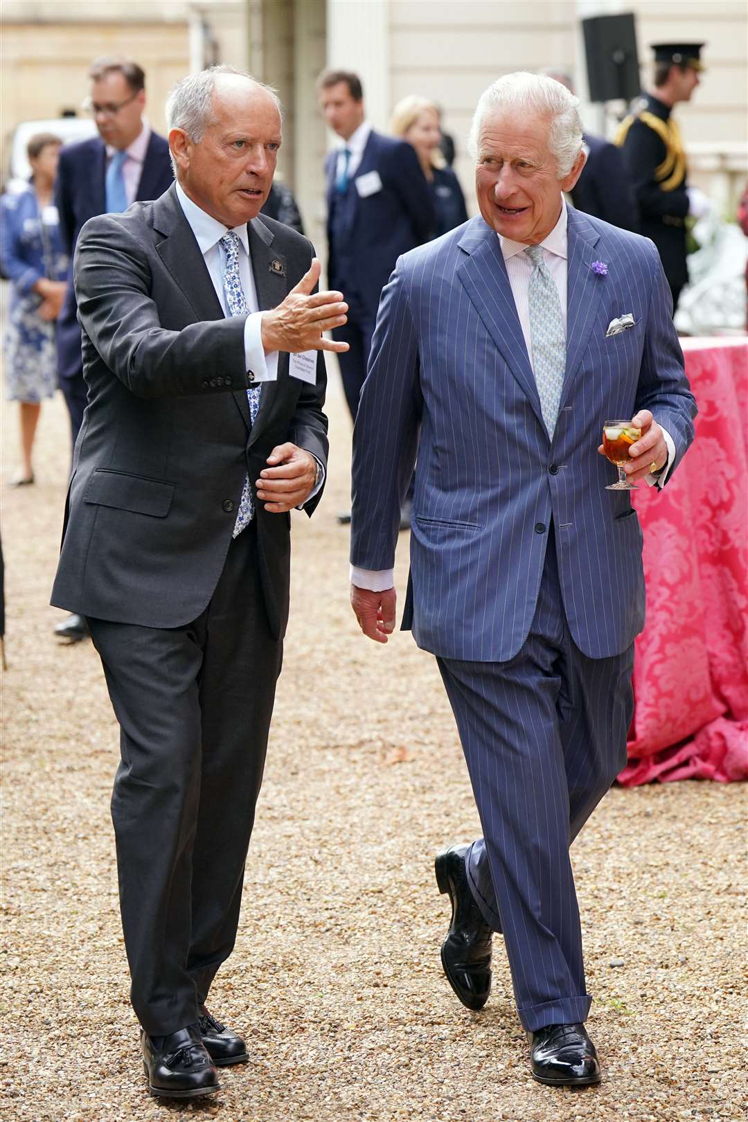 The King and Sir Ian Cheshire during the reception at Clarence House (Jonathan Brady/PA)
