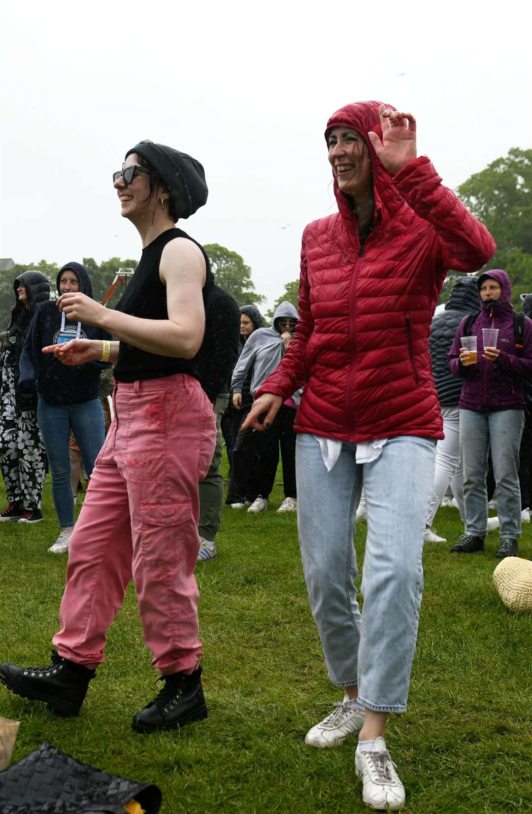 Dancing in the rain at The Gathering. Picture: James Mackenzie