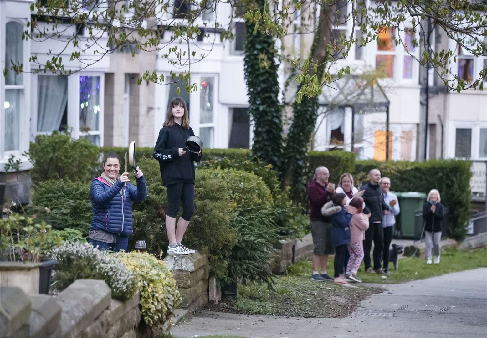 Local residents clapping outside the Nightingale Hospital at the Harrogate Convention Centre in April 2020 (PA)