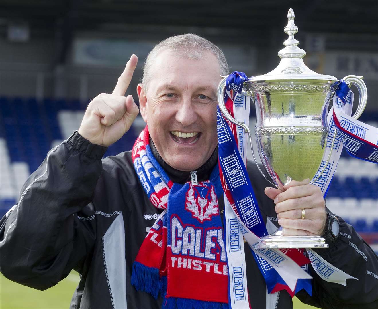 ICT manager Terry Butcher celebrates with the Division One championship trophy. Picture: Ken Macpherson, Inverness.