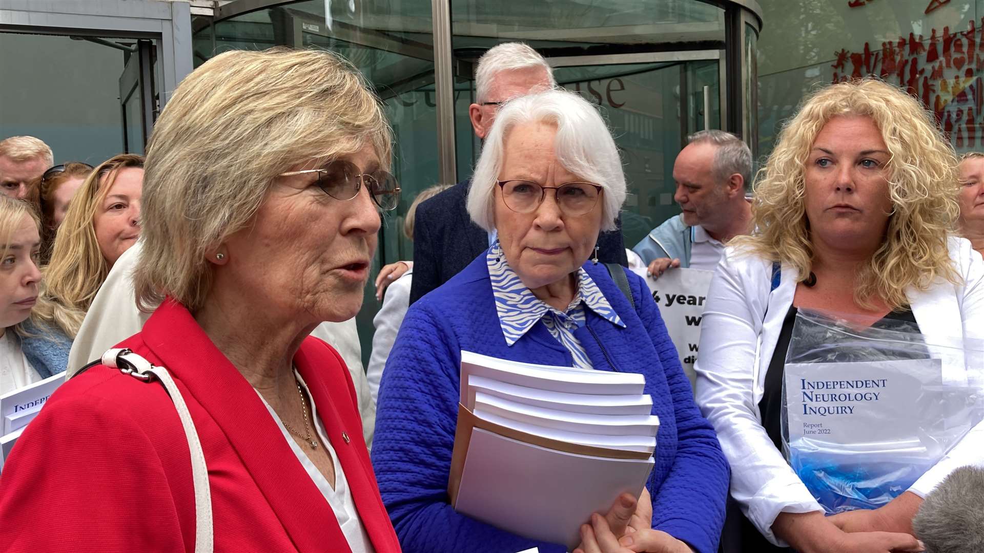 Former patients of Belfast neurologist Dr Michael Watt react following the publication of the report of the Independent Neurology Inquiry. Left to right, Therese Ward, Jean Garland and Danielle O’Neill (Rebecca Black/PA)
