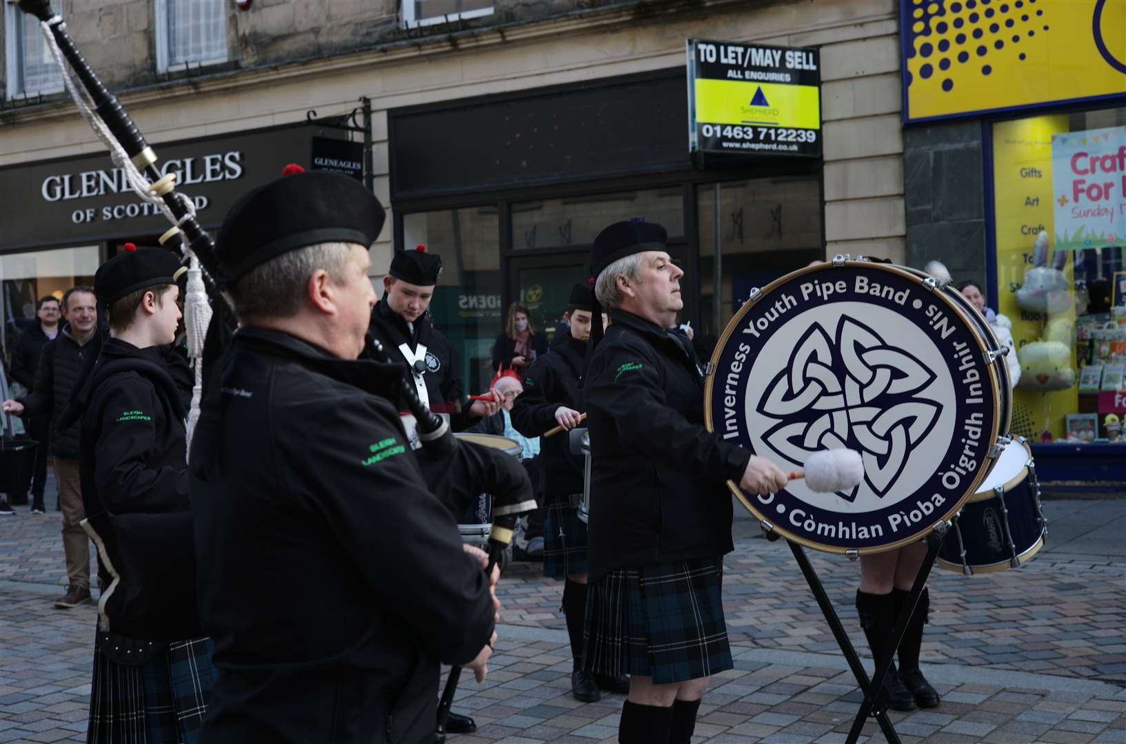 City of Inverness Youth Pipe Band perform in High Street in aid of Ukraine.