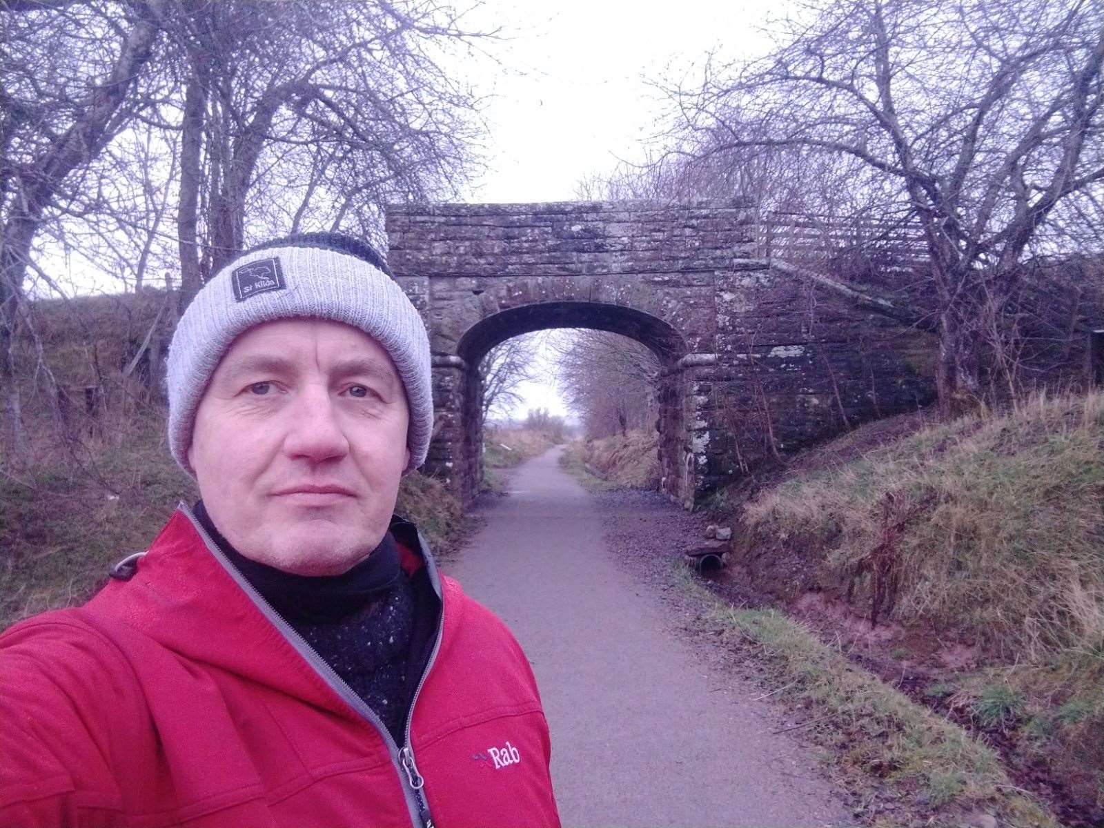 Highland News and Media reporter Hector Mackenzie and a railway bridge you pass on the Peffery Way.