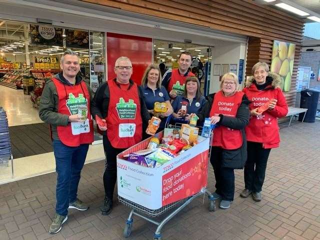 Volunteers with some of the donations which were given during the Tesco Food Collection.