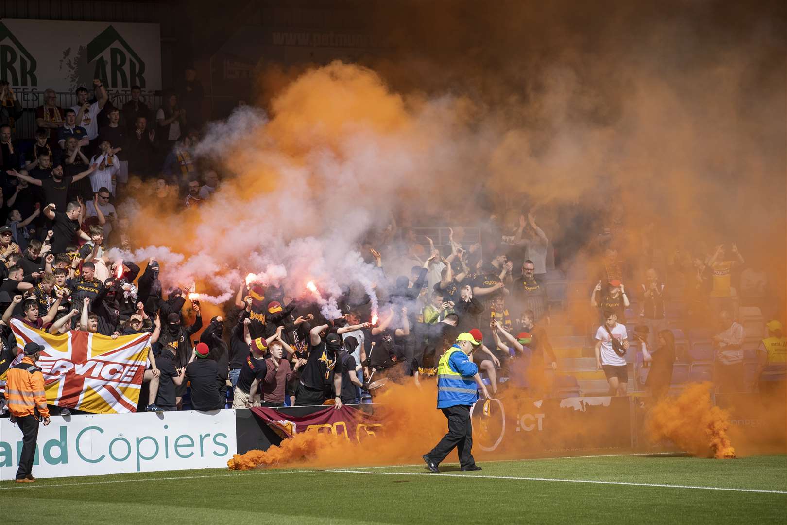 Motherwell fans lit flares at a game against Ross County last season.