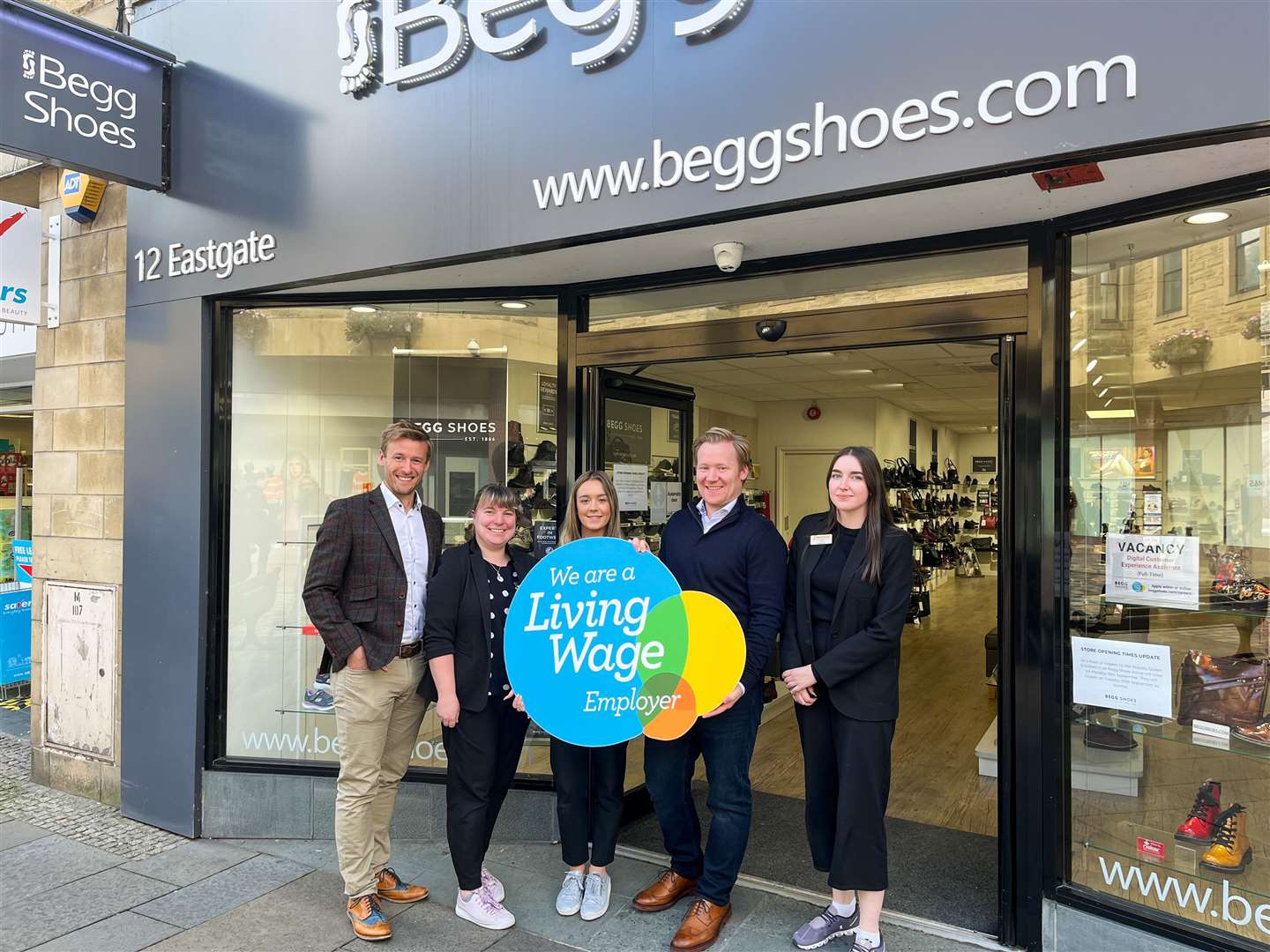 The Begg Shoes team outside the store in Eastgate, Inverness.