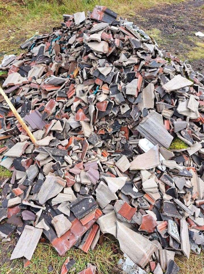 Tiles have been dumped in the Carse Wood.