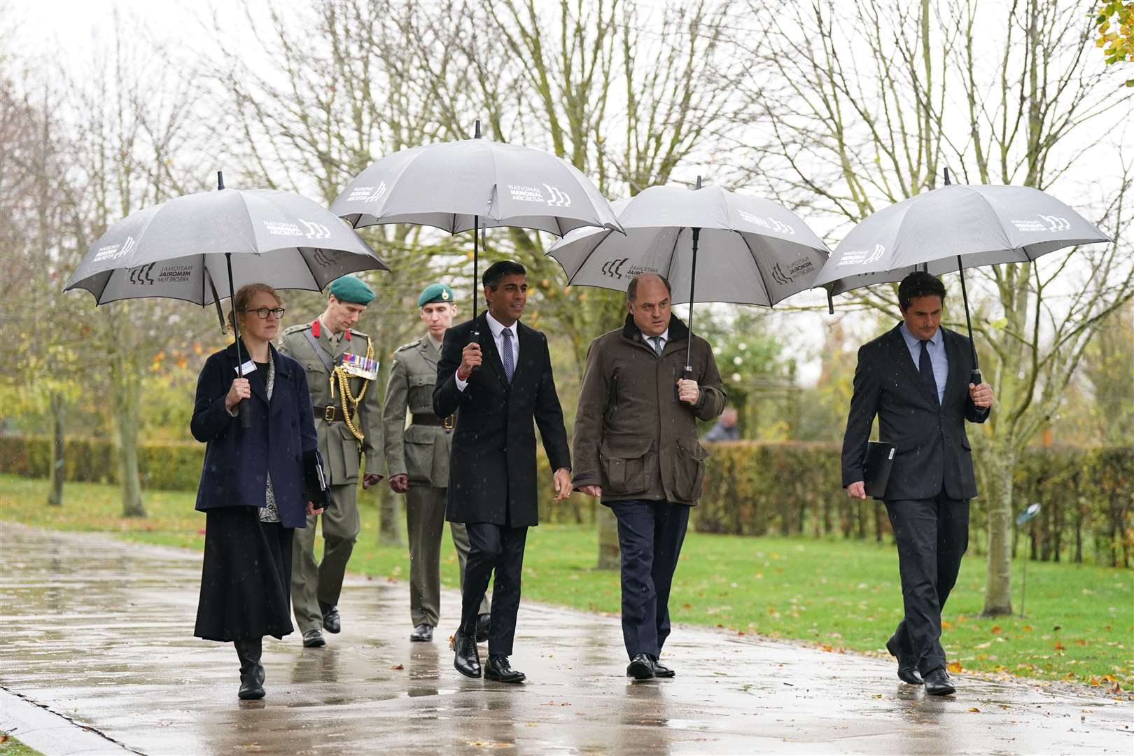 Prime Minister Rishi Sunak, Defence Secretary Ben Wallace, and Minister for Veterans’ Affairs, Johnny Mercer (right), at the National Memorial Arboretum (Joe Giddens/PA)