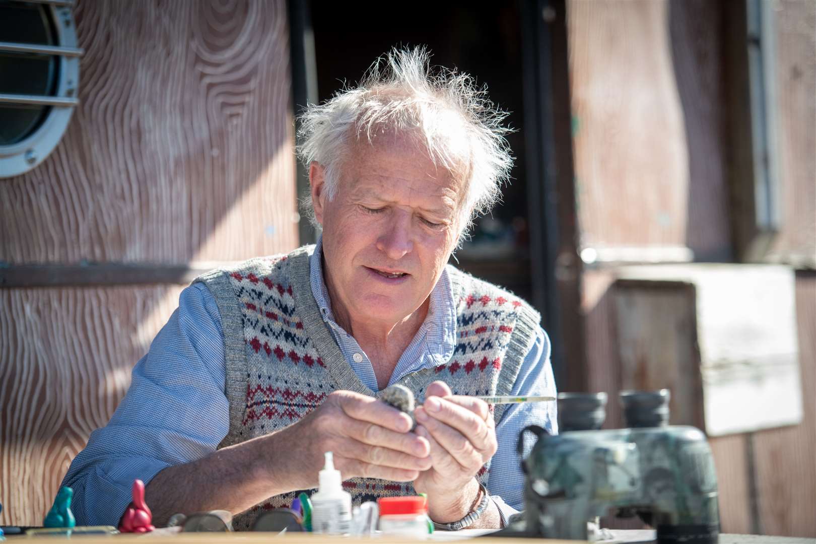While he waits for a sighting of the Loch Ness Monster, Steve Feltham makes clay models of Nessie. Picture: Callum Mackay.
