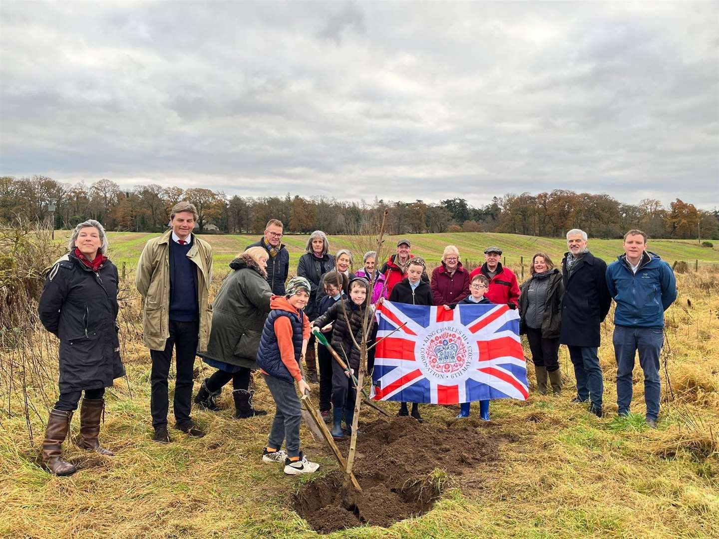 The community attending the tree planting ceremony in Cawdor at the Jubilee Wood, next to Ballichknockan Farm.