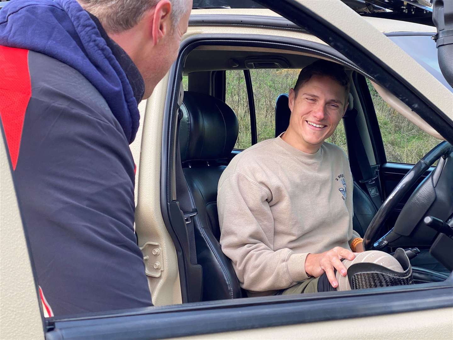 Mr Van Niekerk was sitting in the Jeep as watches the video message from Harry (National Geographic/Van Niekerk family/PA)