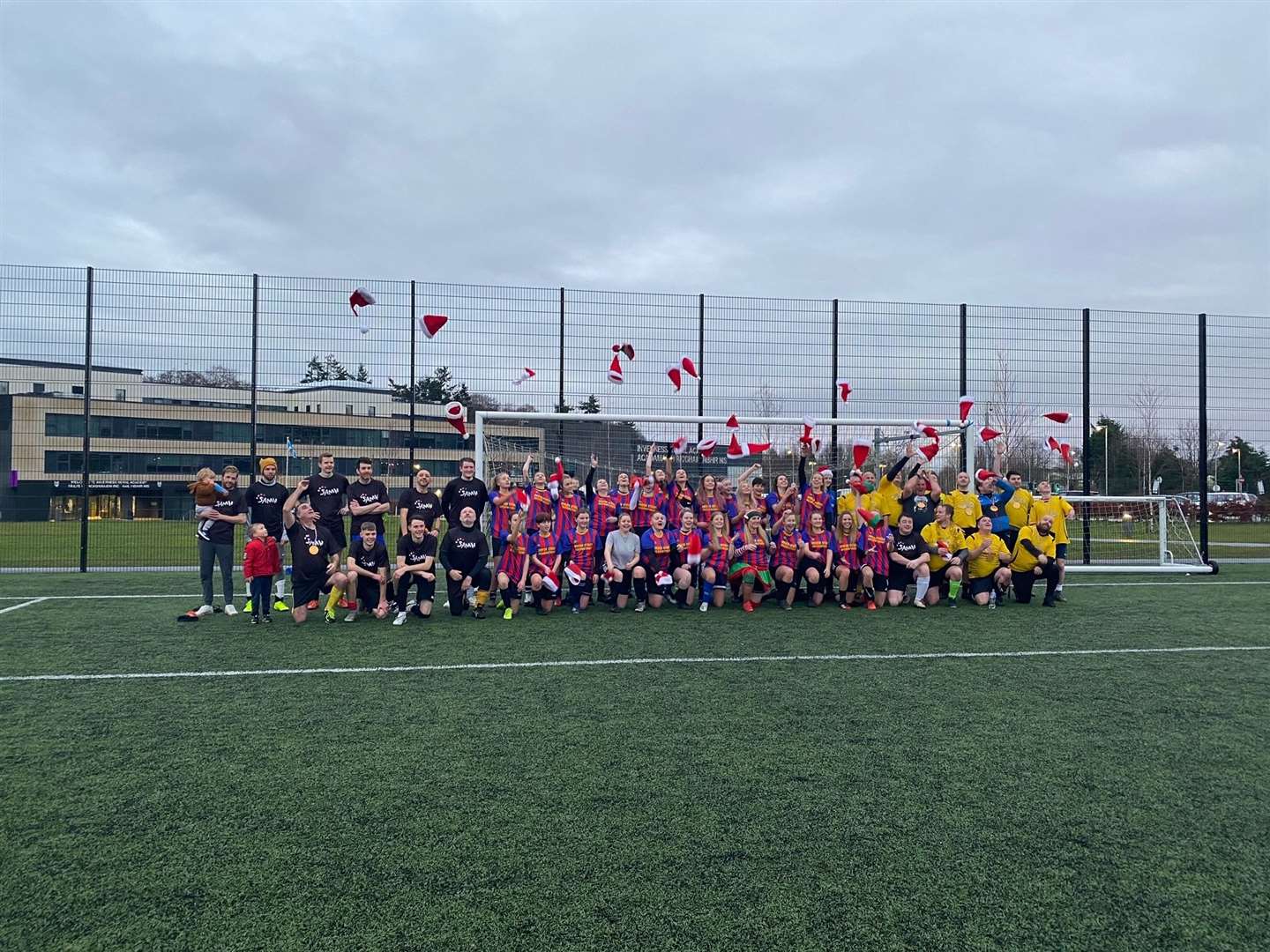 Players take part in a football tournament in tribute to Carolyn Firth.