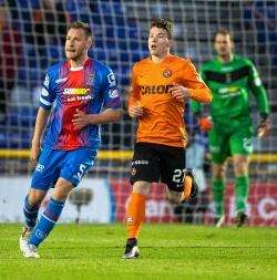 Alistair Coote in action against ICT's Gary Warren last Friday in Dundee United's 3-2 win.