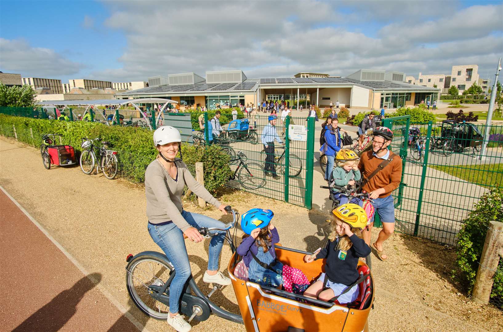 Eddington’s primary school with parents and pupils using bikes (photojB/Sustrans/PA)