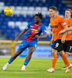 Caley Thistle's Andrea Mbuyi-Mutombo gets ahead of Dundee United's John Rankin.