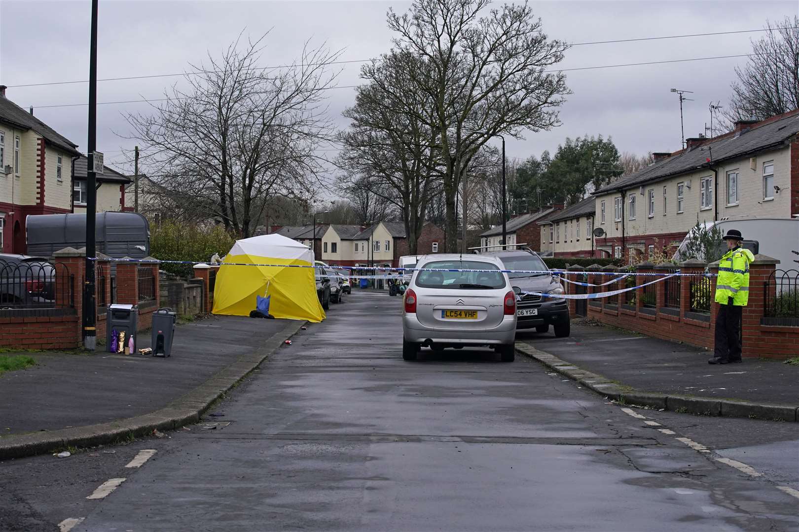 A forensic tent on Thirlmere Avenue in Stretford, Manchester, near to the scene where a 16-year-old boy was fatally stabbed (Peter Byrne/PA) 