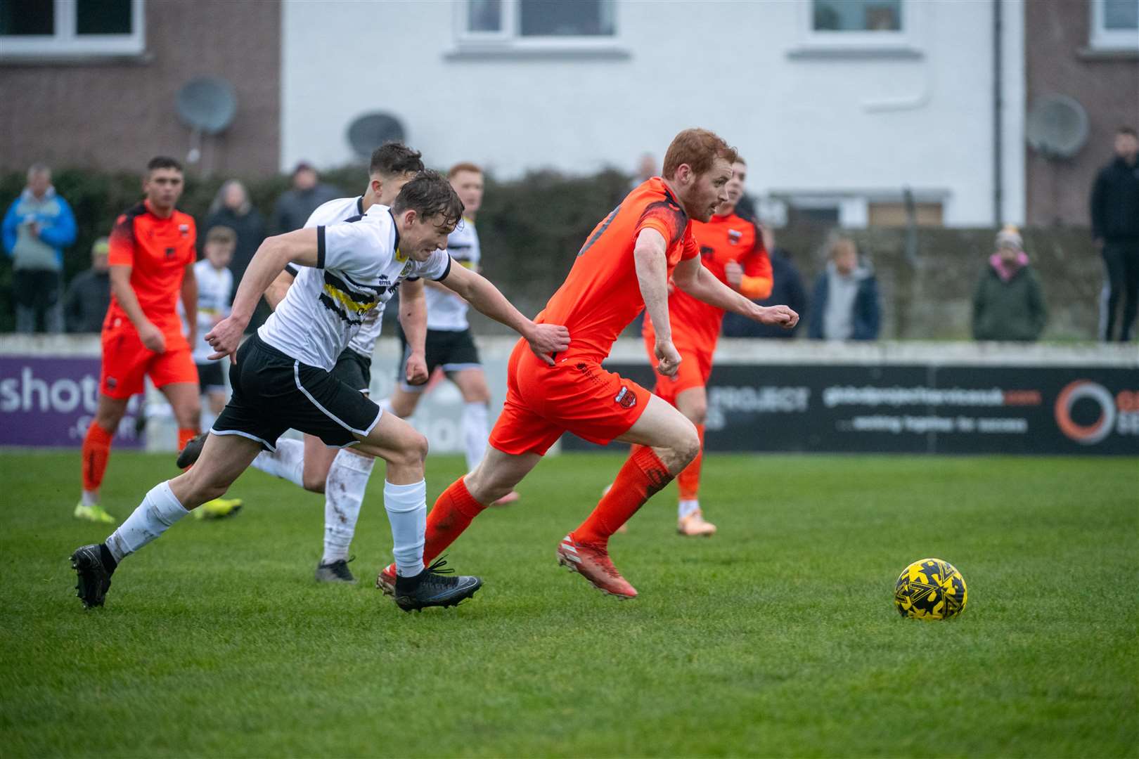 Zach Machpee (Clach) and Greig Morrison (Rothes). Picture: Callum Mackay