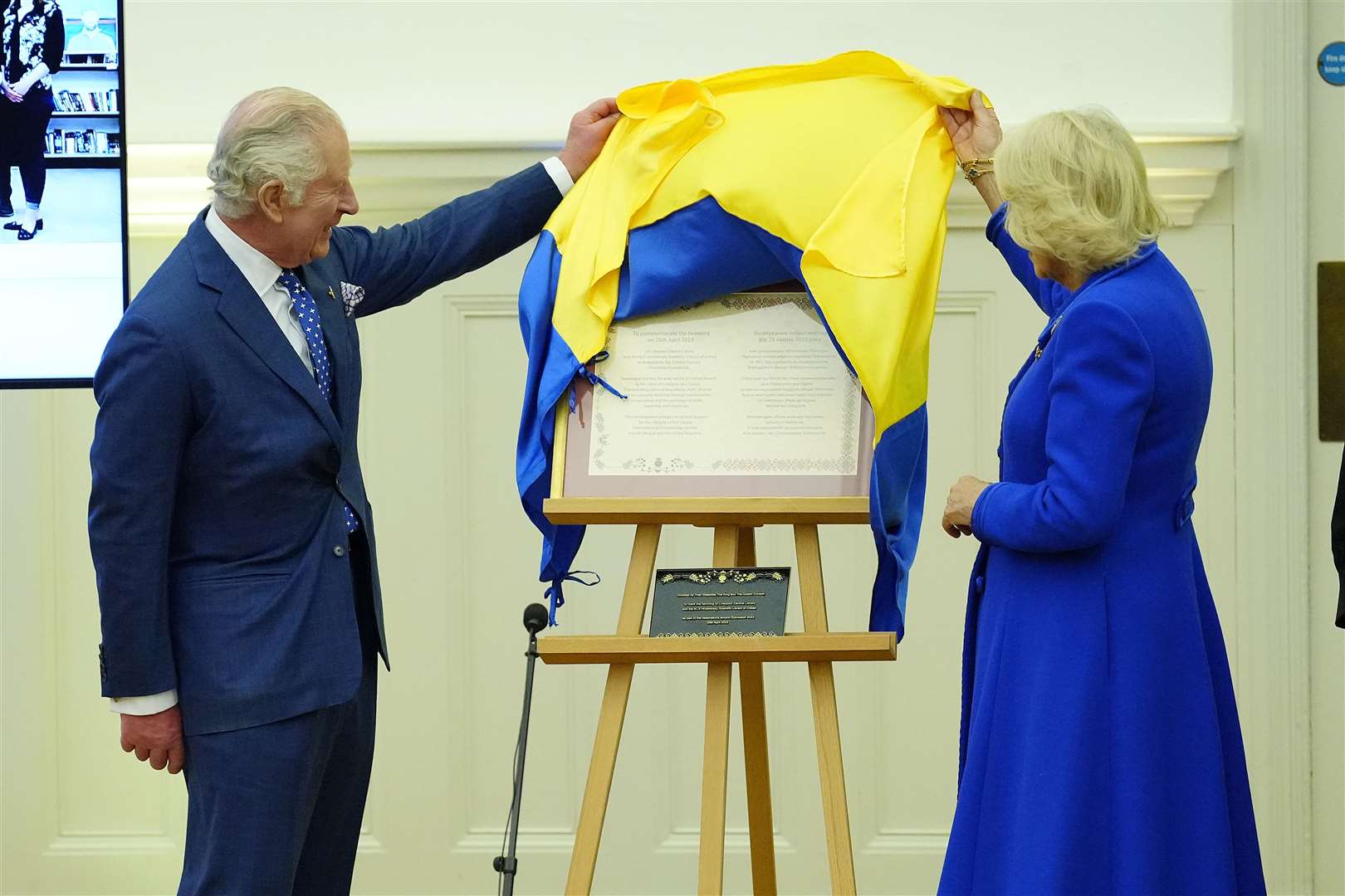 The King and Queen during a visit to Liverpool Central Library, to officially mark its twinning with Ukraine’s first public library (PA)
