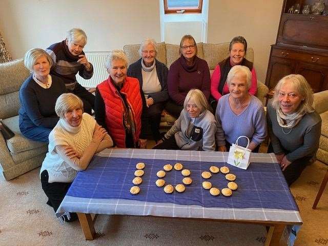 Members at a book club meeting on the 100th birthday of Inner Wheel.