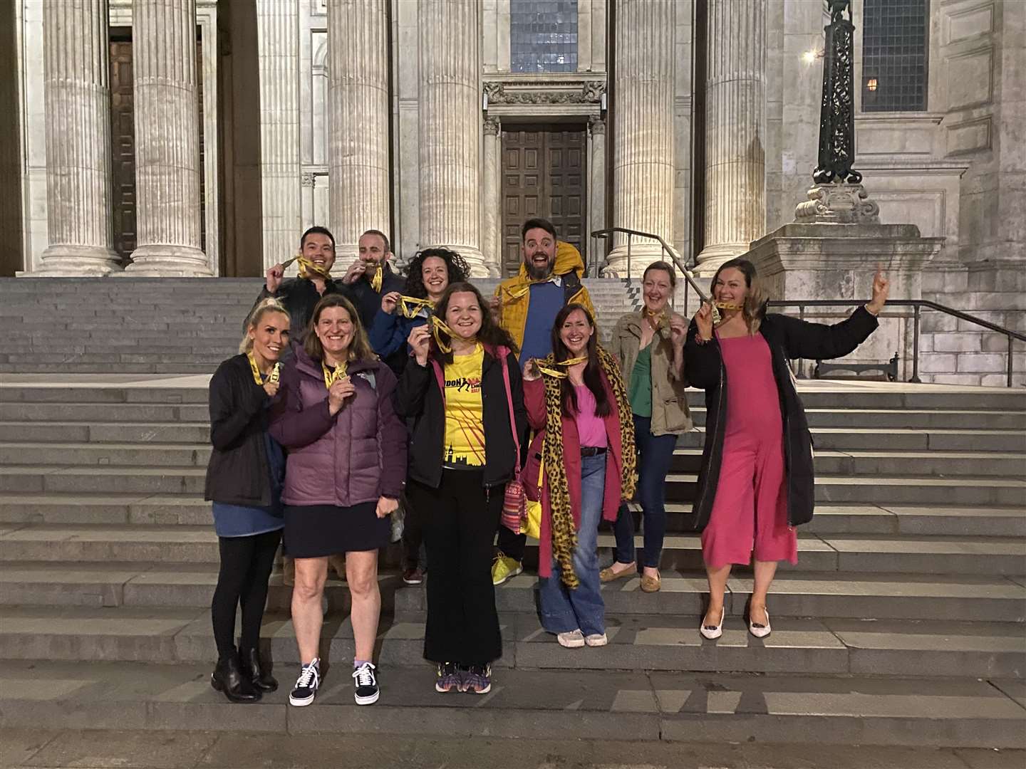 Wendy Morgan (far right in pink) and her group on the steps of St Paul’s Cathedral.
