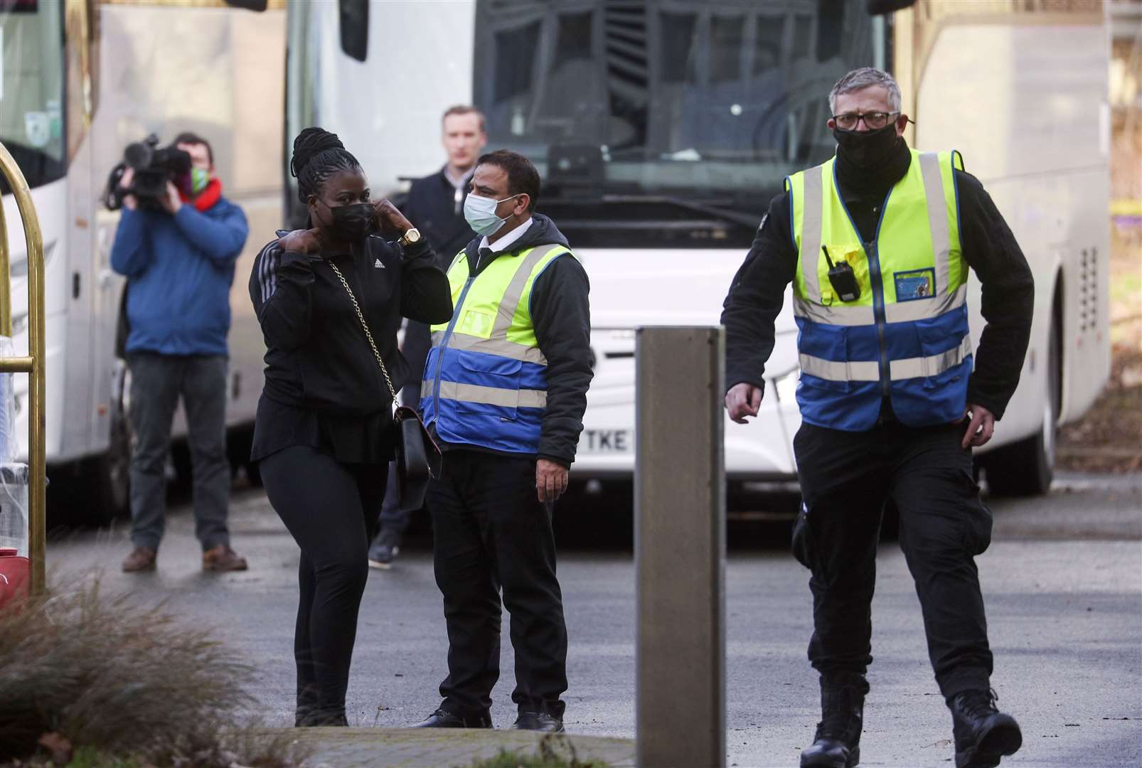 Passengers arrive at a Holiday Inn near Heathrow Airport, where they will remain during a 10 day quarantine period after returning to England from one of 33 “red list” countries (Steve Parsons/PA)