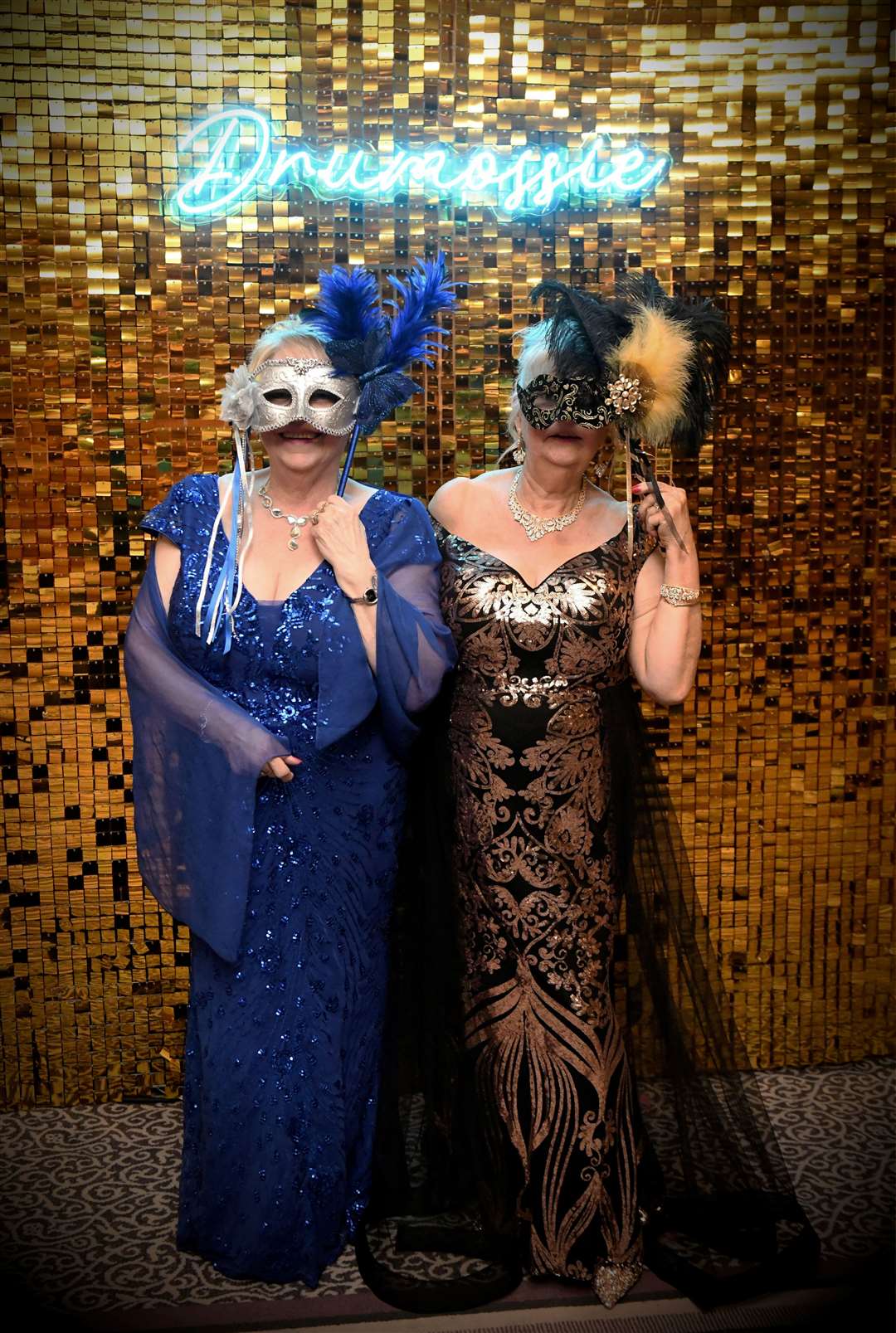 Glamorous attendees of the ball.