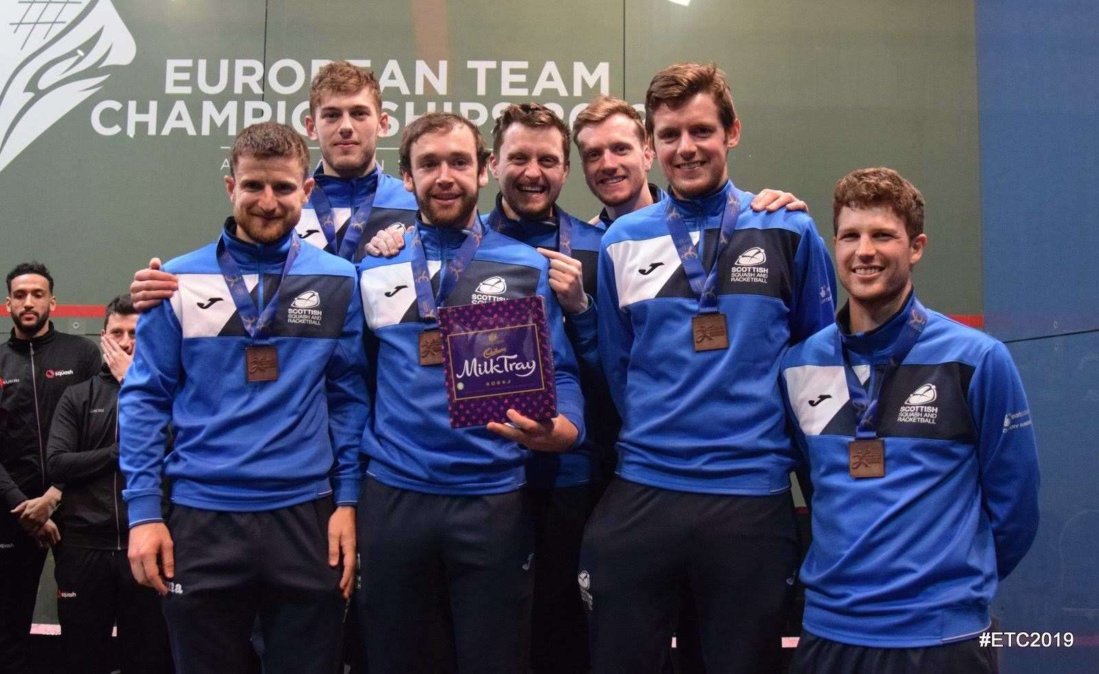 Alan Clyne (left) and Greg Lobban (second right) with the Scotland squad that won bronze at the European Championships.