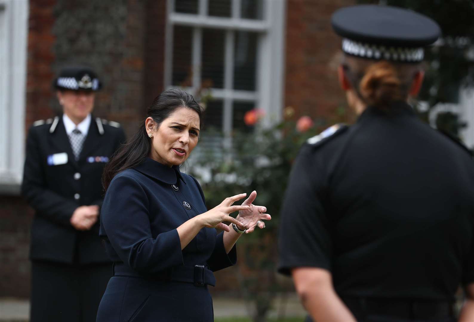 Priti Patel has said she would report neighbours for breaching the ‘rule of six’ (Gareth Fuller/PA)