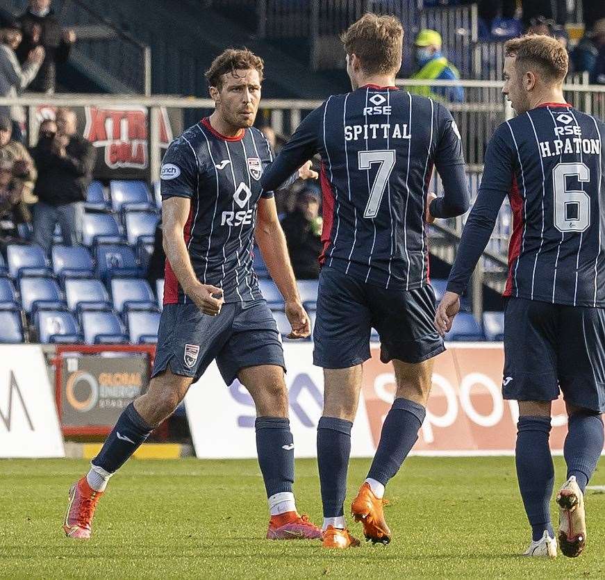 Picture - Ken Macpherson, Inverness. Ross County(2) v St.Mirren(3). 16.10.21. Ross County's David Cancola praises Blair Spittal after his goal direct from a free-kick.