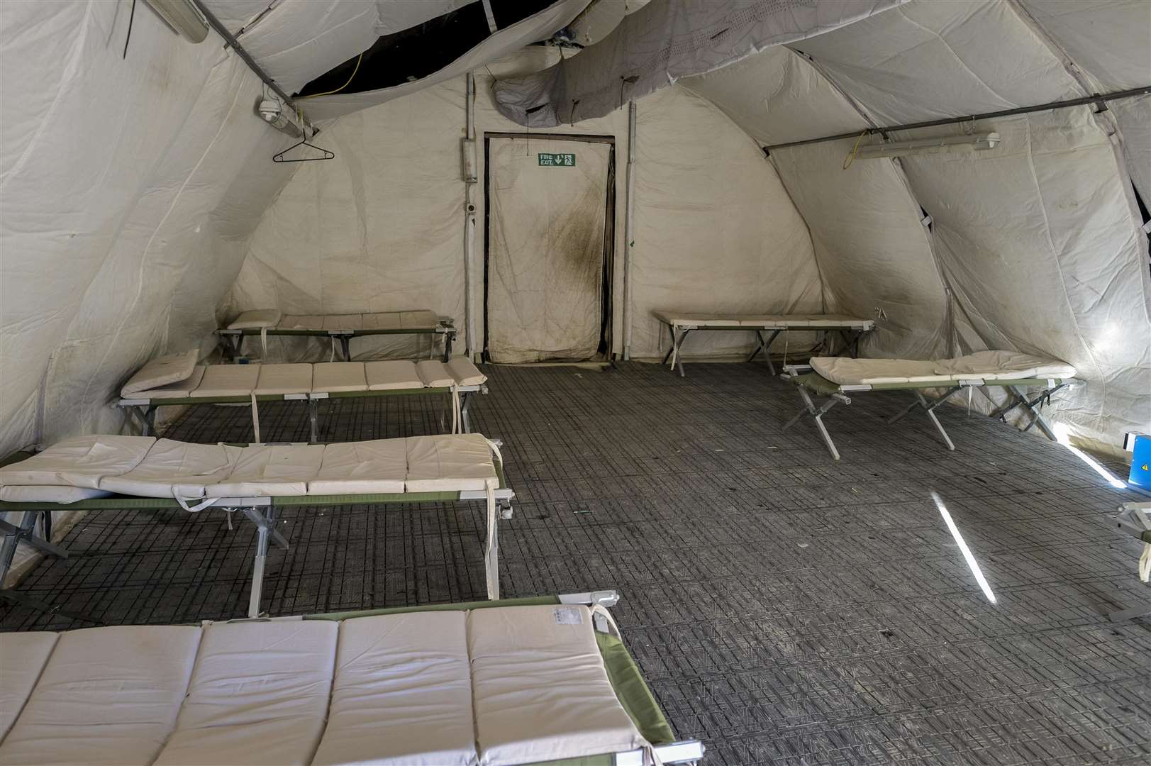 Empty cot beds inside soldiers tented accommodation in Camp Bastion, Afghanistan (Ben Birchall/PA)