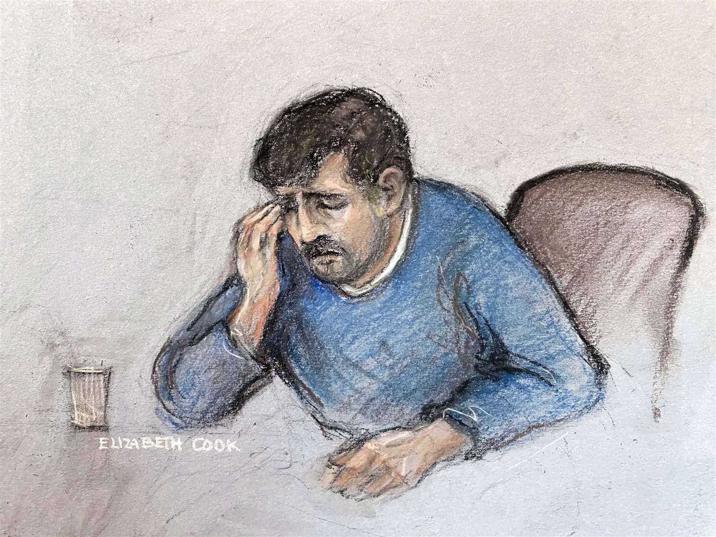 Court artist sketch by Elizabeth Cook of Thomas Cashman, 34, wiping away tears in the dock after being found guilty at Manchester Crown Court of murdering nine-year-old Olivia Pratt-Korbel (Elizabeth Cook/PA)