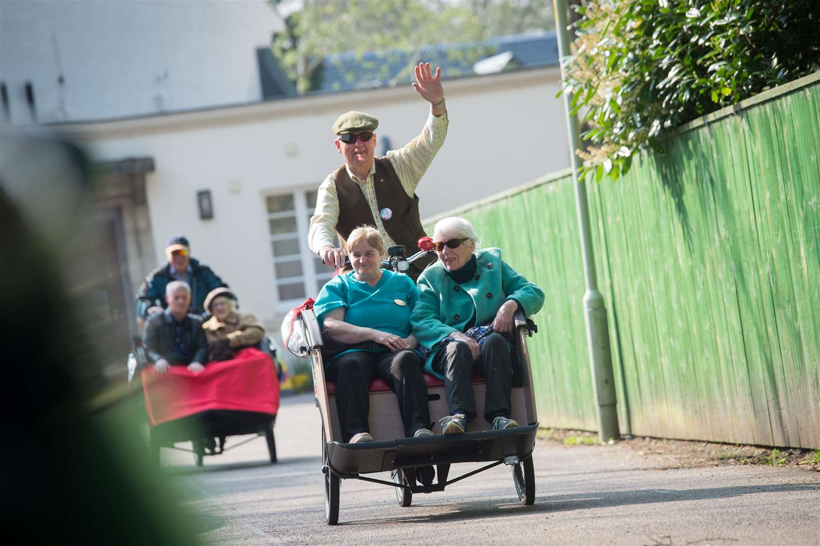 Cycling Without Age trikes at Isobel Fraser Care Home, Mayfield Road, Inverness...Mick Heath MBE drives Lillian Grant and Millie Johns...Picture: Callum Mackay. Image No..