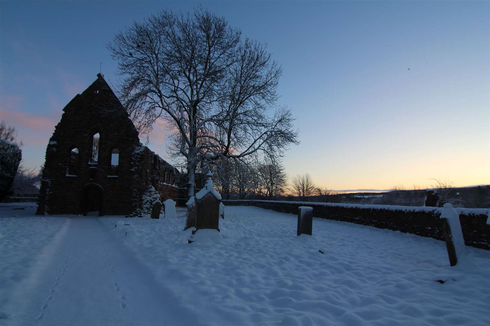 Beautiful sunrise over Beauly in the snow.