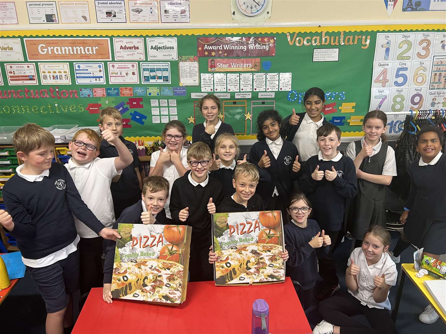 Pupils were delighted with their pizza prize.