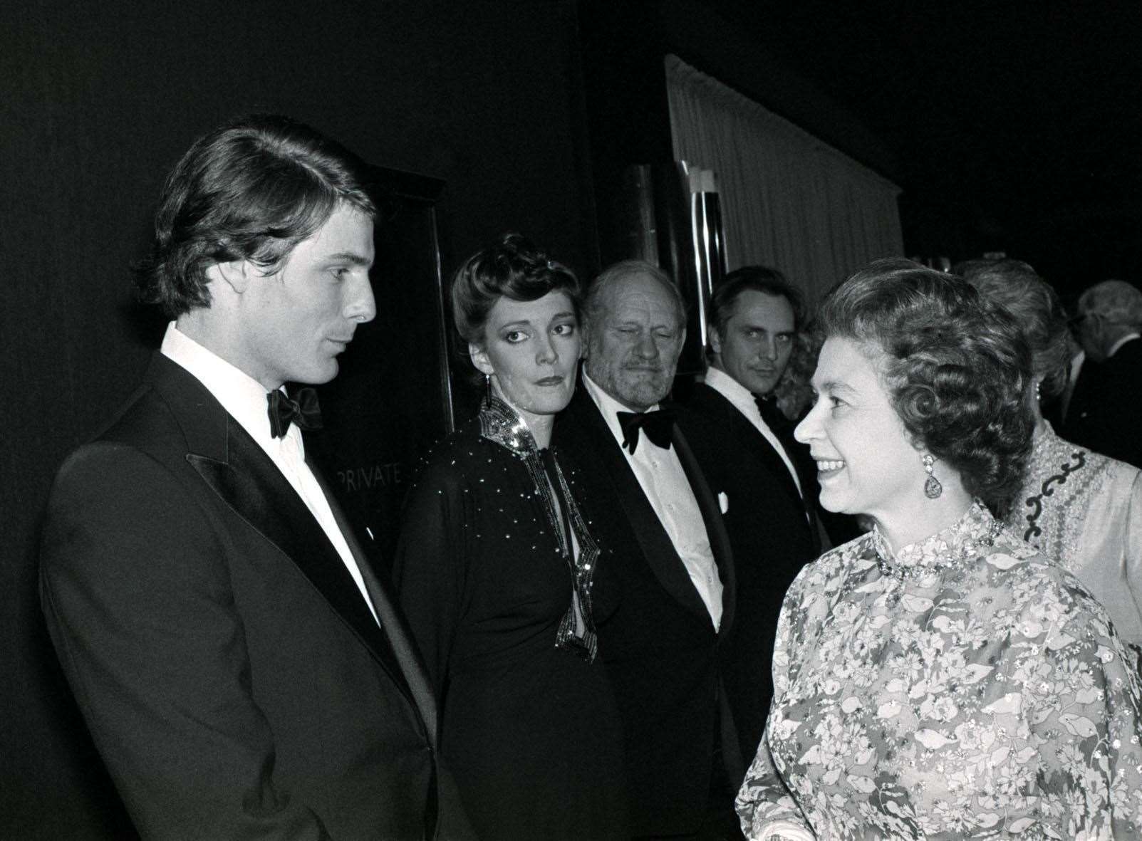 The Queen, who was attending the European royal charity premiere of Superman, meets Christopher Reeve at the Empire Theatre in Leicester Square in 1978 (PA)