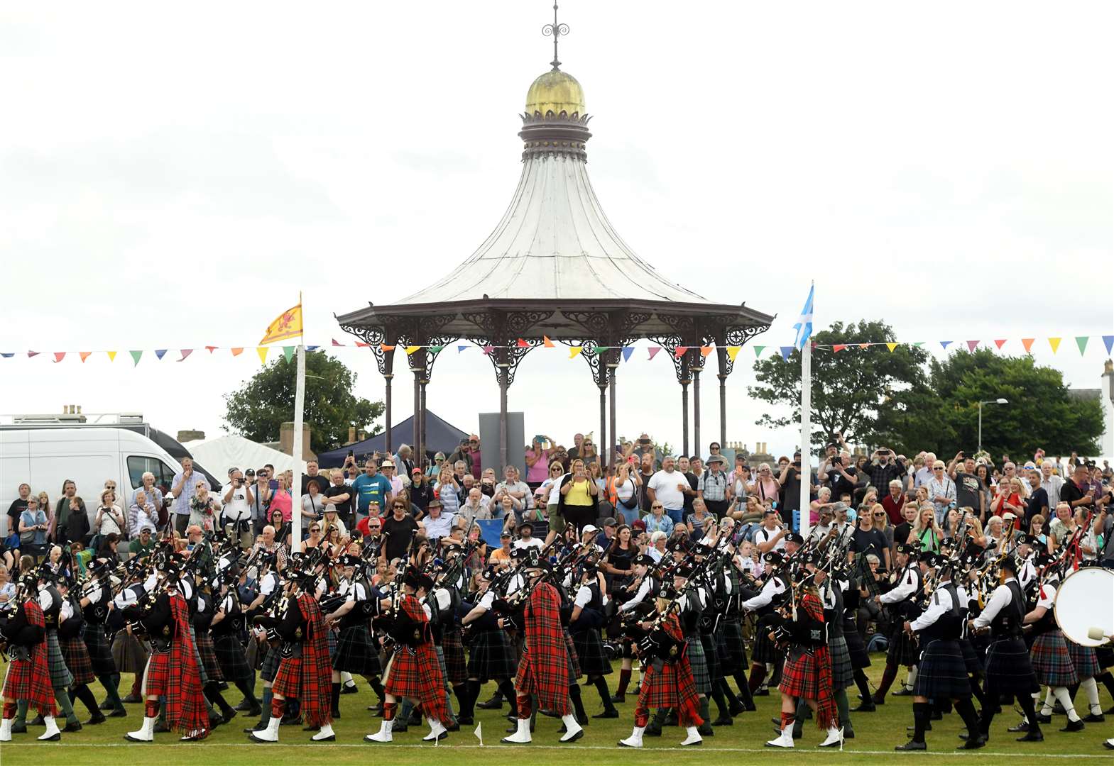 The pipe band passing the band stand. Picture: James Mackenzie.